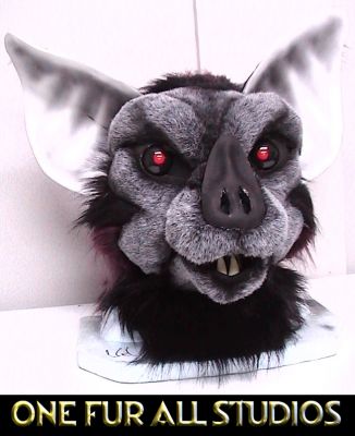 His face was inspired by a number of real species of bats.  I especially loved building that nose!
